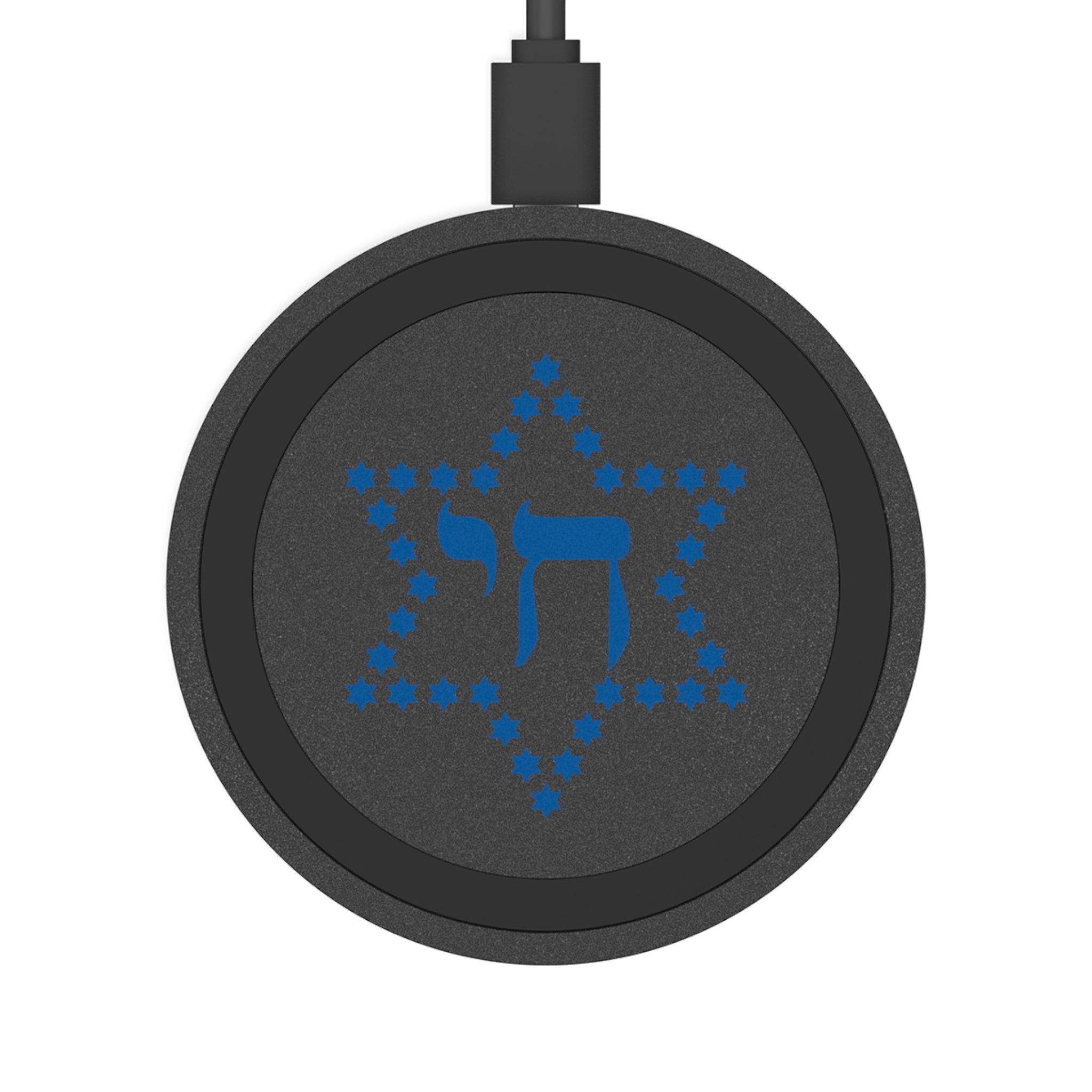 Round black device with blue symbol on a white background