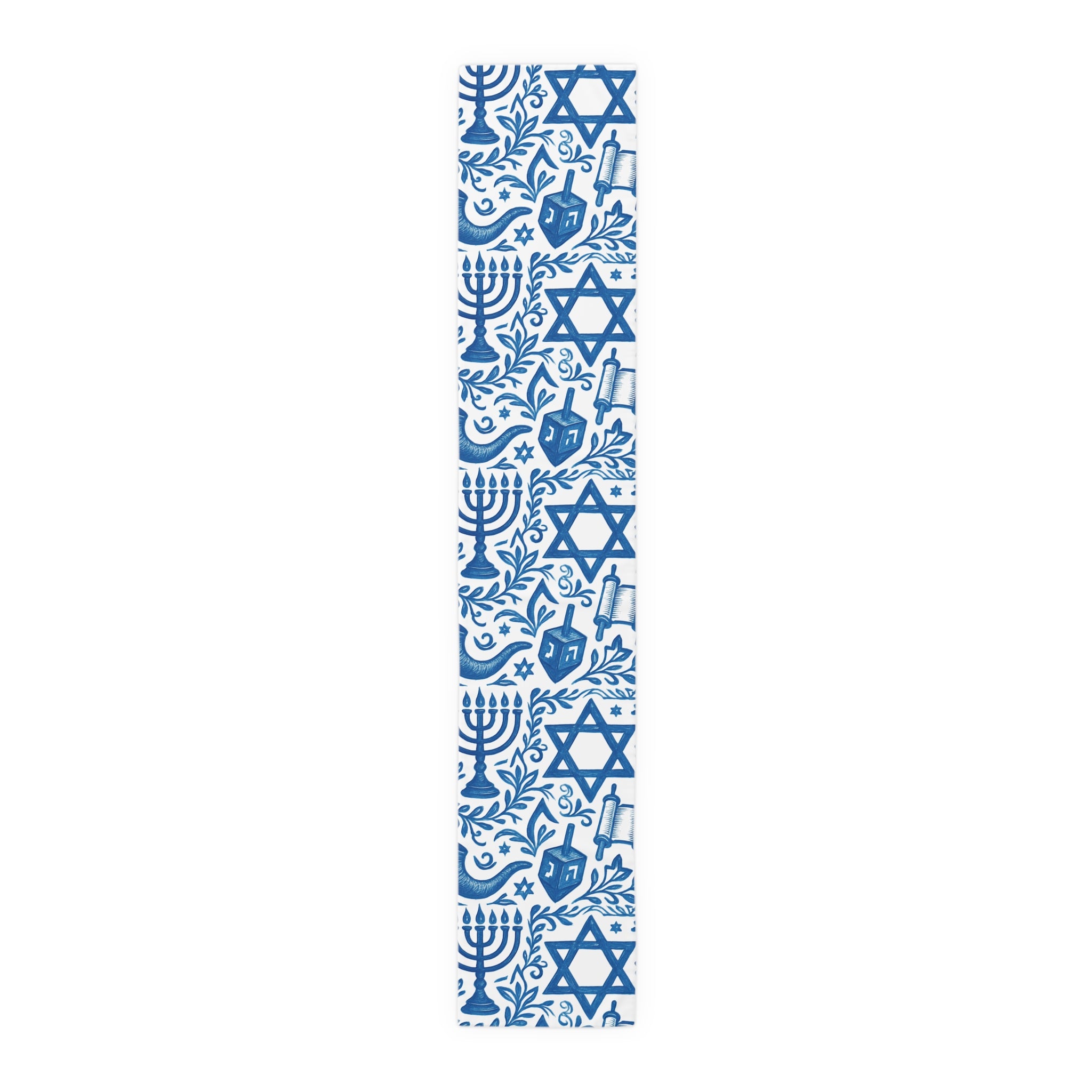Blue and white decorative matzah cover with Star of David and menorah design on a white background