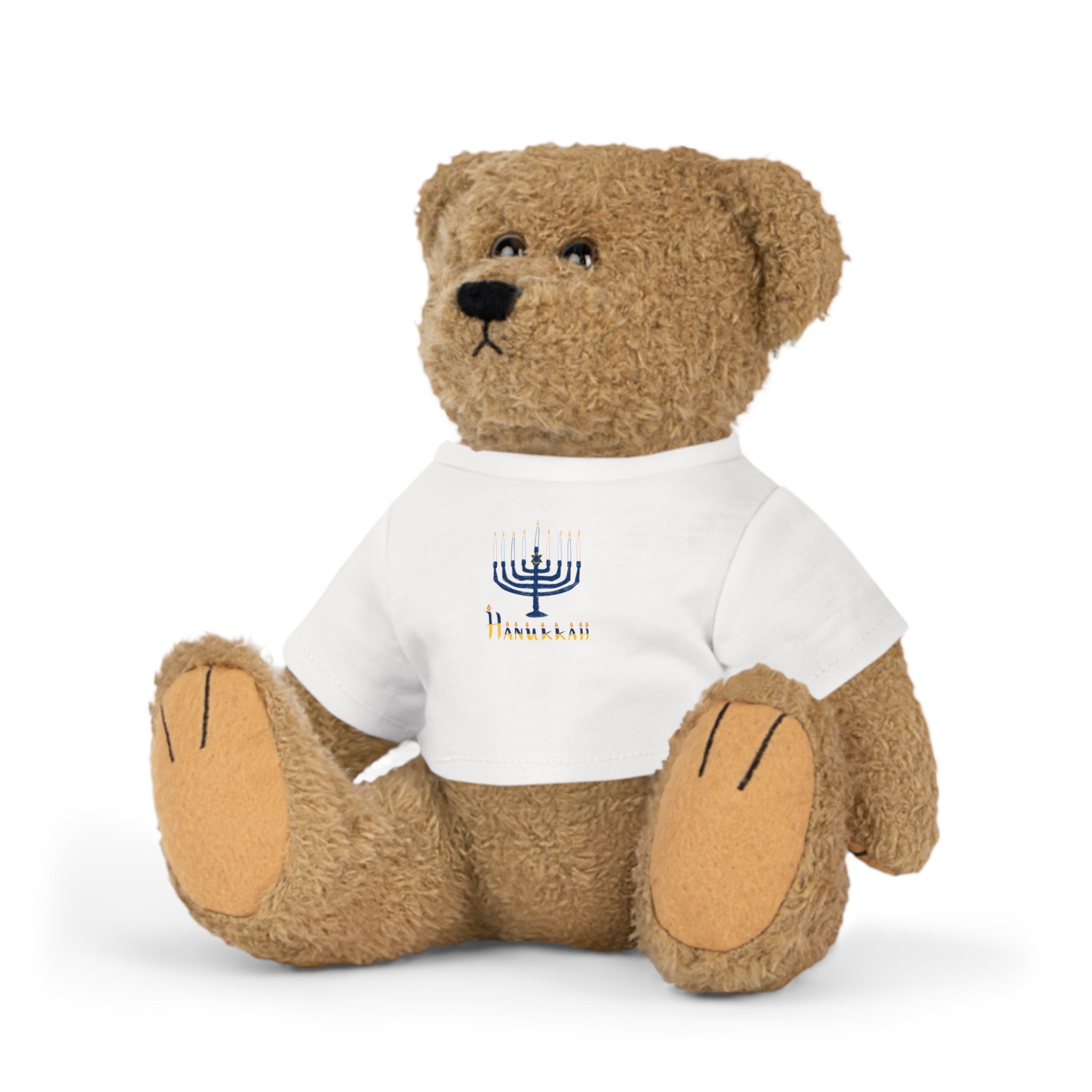 Plush teddy bear wearing a white shirt with a logo on a white background